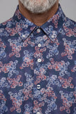 La chemise Claude Beau-fils - bouton signature